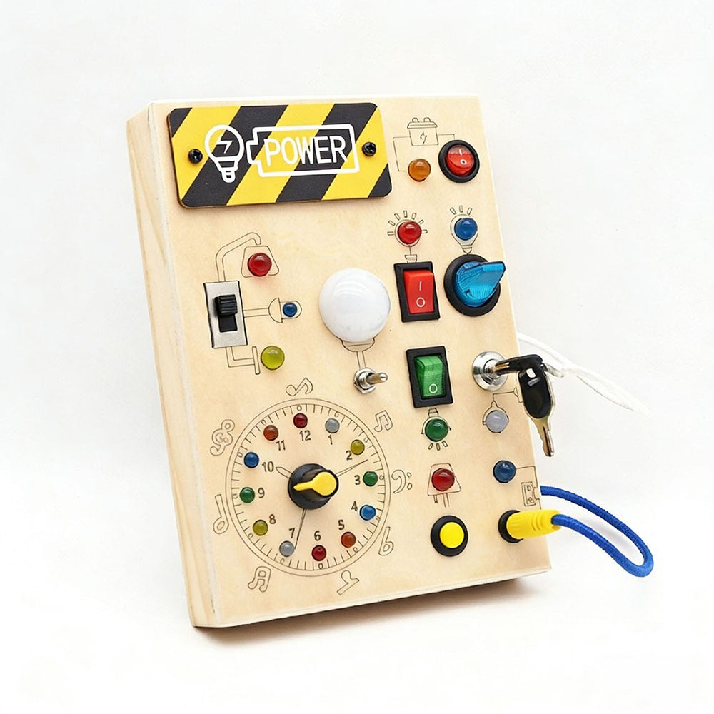 Wooden control panel with colorful buttons and a 'Power' sign on a white background