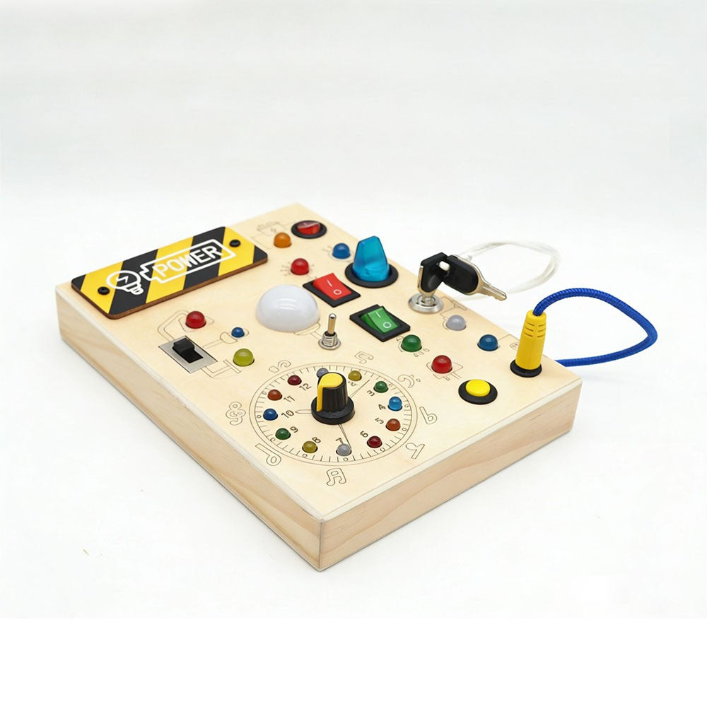 Children's electronic circuit board kit with buttons and connectors on a white background