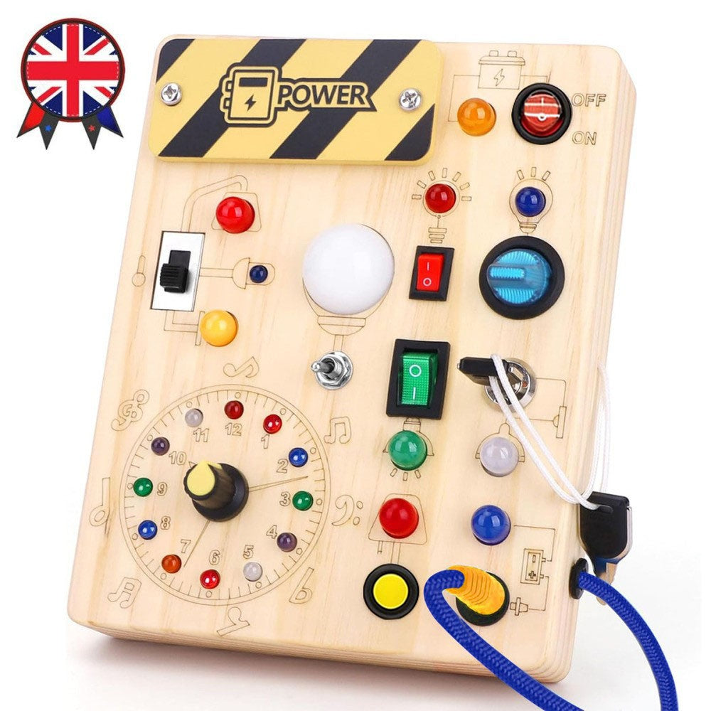 Wooden control panel with colorful buttons and switches on a white background